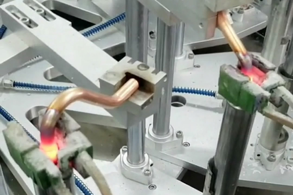 手持式高频加热机配合旋转设备自动化焊接铜管